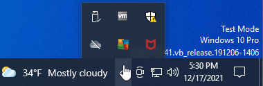 Click on the "Show hidden icons" arrow.