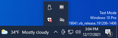 Click the "Show hidden icons" arrow.